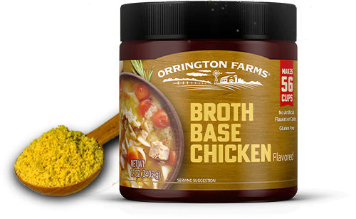 chicken broth base container with wooden spoon